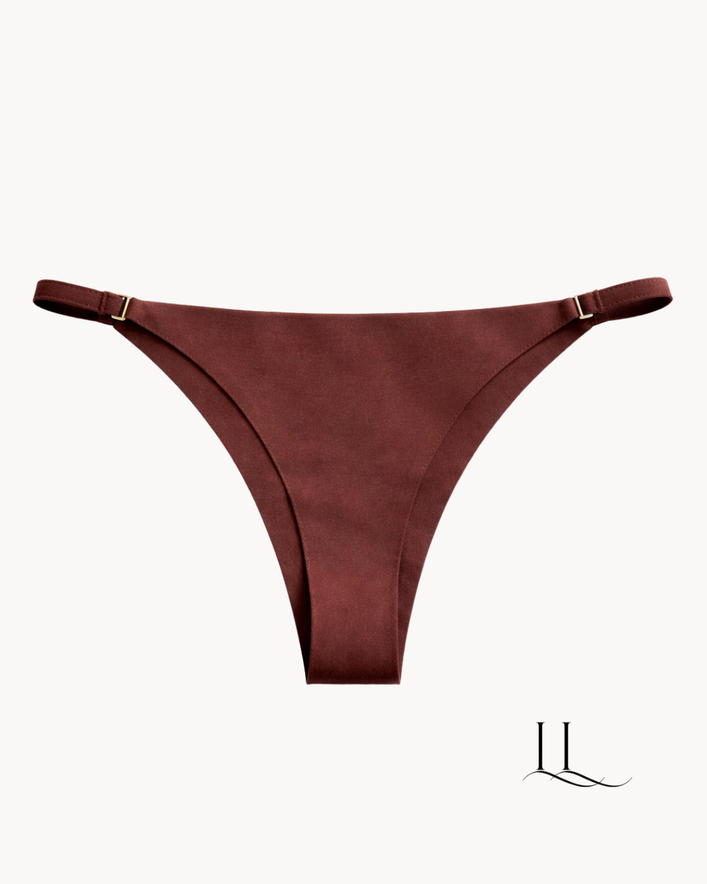 Calcinha fio dental marrom ELLEVE com design minimalista e ajuste confortável. Valoriza o corpo com leveza e não marca sob a roupa. Compre na uselleve, loja oficial ELLEVE em uselleve.com.