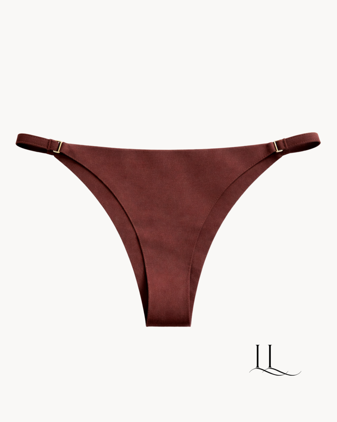 Calcinha fio dental marrom ELLEVE com design minimalista e ajuste confortável. Valoriza o corpo com leveza e não marca sob a roupa. Compre na uselleve, loja oficial ELLEVE em uselleve.com.