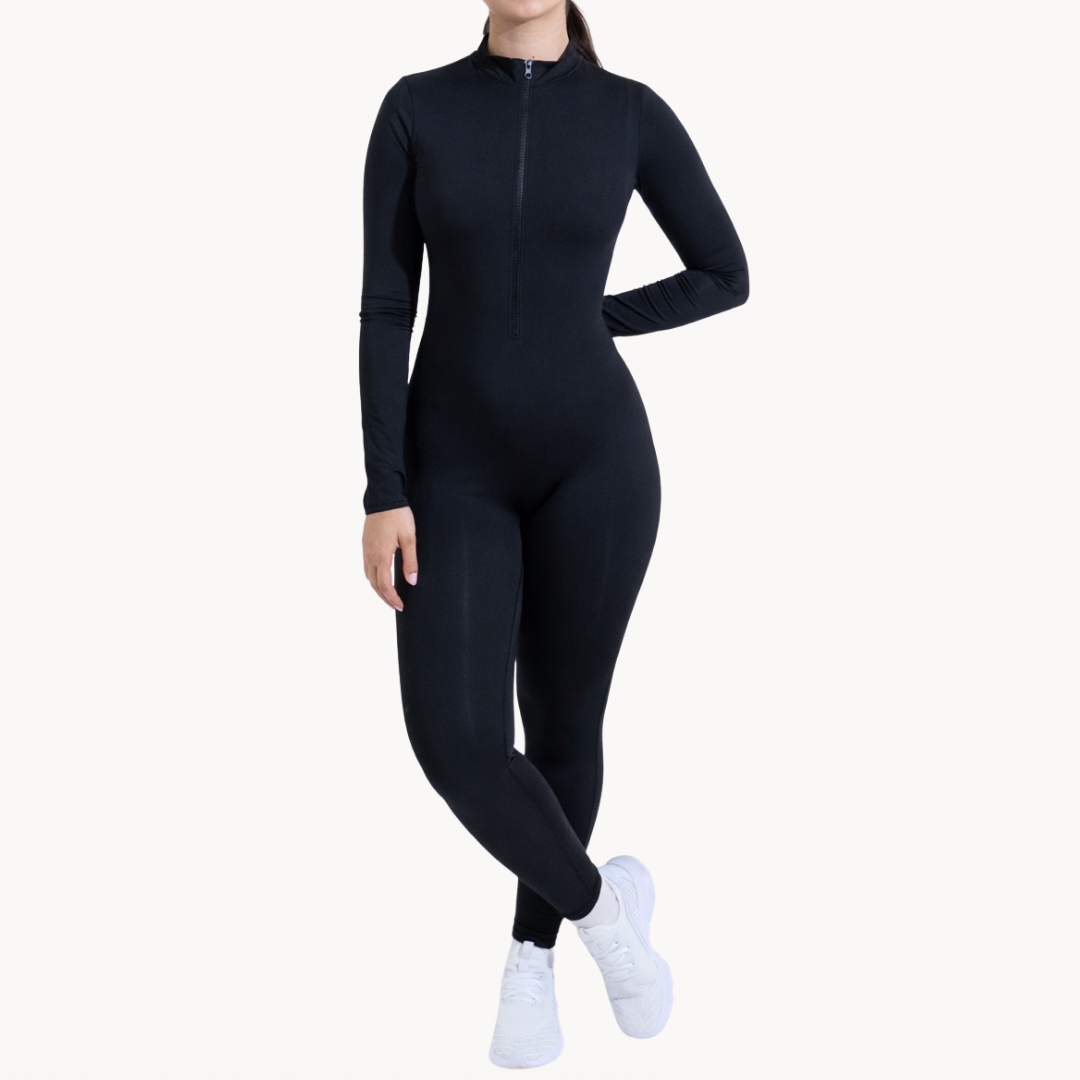 Macaquinho full body preto ELLEVE com mangas longas e efeito segunda pele. Modelagem ajustada, tecido elástico e respirável para conforto no dia a dia ou treino. Design minimalista e versátil. Compre na uselleve.com.
uselleve elleve