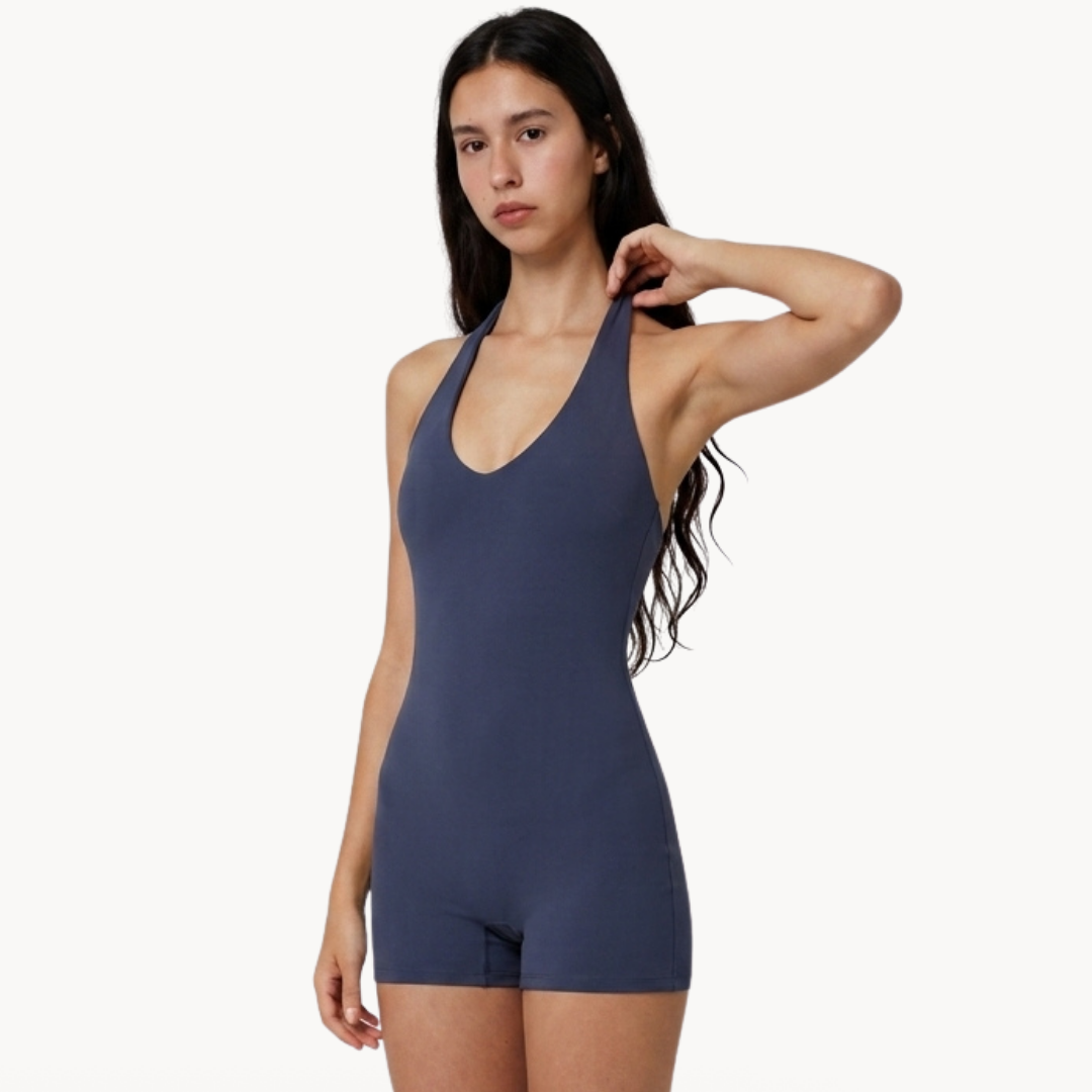Macaquinho fitness feminino seamless azul marinho estilo body halter, macacão fitness feminino para academia, treino, urbano, wellness, pilates e yoga, roupa fitness feminina com tecido tecnológico e modelagem ajustada da uselleve elleve elleve.com